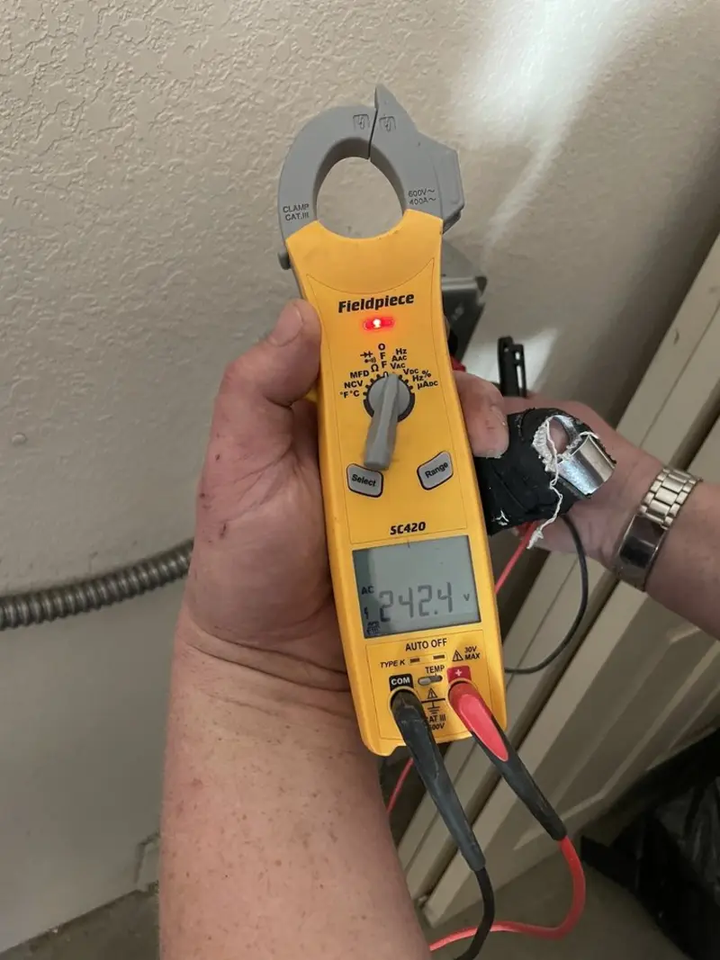 Voltage testing with clamp meter during Generator Installation in Grass Valley